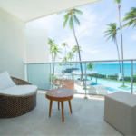 Apartamento de 1 dormitorio en Presidential Suites Cabarete – Cocina, terraza y vista a la piscina o al mar